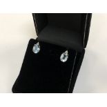 A pair of 14ct gold diamond and blue topaz earrings CONDITION REPORT: Length