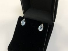 A pair of 14ct gold diamond and blue topaz earrings CONDITION REPORT: Length