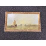 A gilt framed textured print - figures in boats