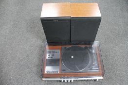 A Sanyo HNK-70 stereo music system with speakers