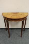 A reproduction inlaid mahogany d-shaped hall table,