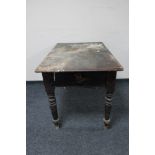 An antique pine kitchen table fitted a drawer CONDITION REPORT: 112cm long by 69cm