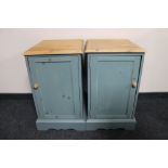 A pair of reclaimed pine bedside cabinets
