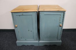 A pair of reclaimed pine bedside cabinets