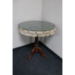 A Victorian mahogany tripod pedestal occasional table