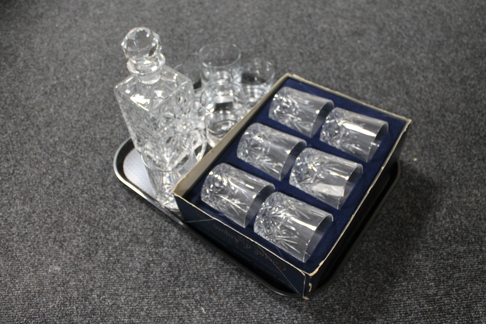 A tray of glass, set of six boxed Cristal D'arques whisky glasses, decanter,