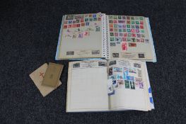 Two stamp albums, an Army Prayer Book and another book, St.