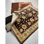 A Persian geometric design rug on red ground (a/f) together with three further rugs