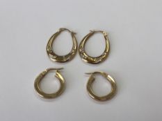 Two pairs of 9ct gold hoop earrings, 2.1g gross.