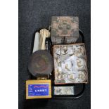 A tray of oriental pieces, boxed miniature tea service, hundred year calendar, jewellery basket,