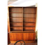 A mid century Danish bookcase with cupboards beneath