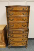 A reproduction walnut double chest,