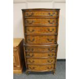 A reproduction walnut double chest,