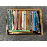 A box of Reader's Digest books, History of the World,