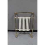 A brass framed Victorian style 8-bar radiator CONDITION REPORT: Height 92.