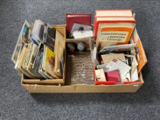 A box of stamp collector's albums, postcards, tea card albums, cigarette cards,