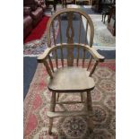 A 20th century pine child's high chair CONDITION REPORT: Height 98 cm, width 44 cm,