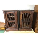 A pair of Eastern hardwood bedside cabinets