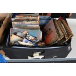 A suitcase containing a large quantity of vinyl records