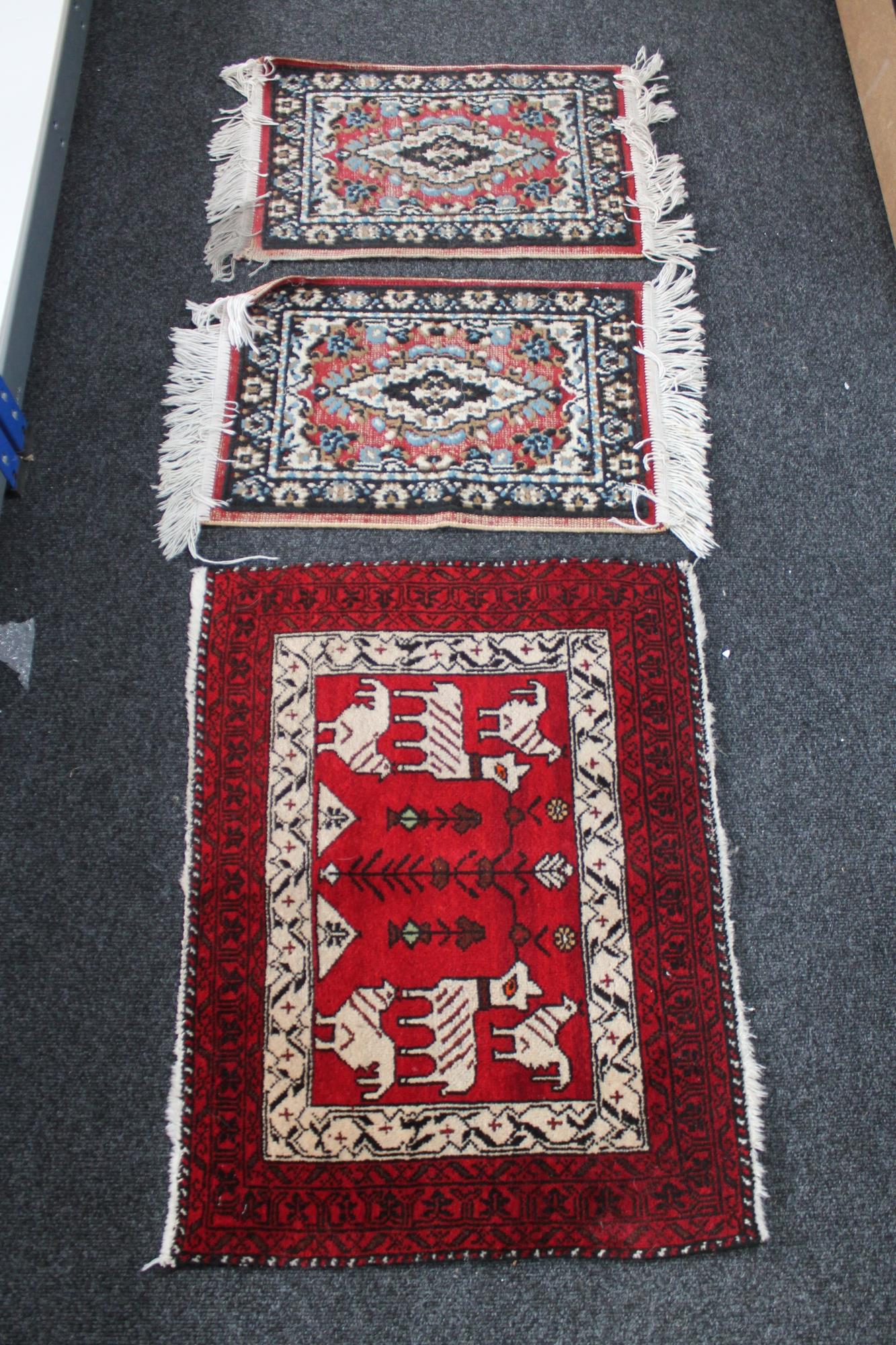 Four eastern rugs