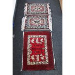 Four eastern rugs