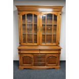 A reproduction mahogany bookcase