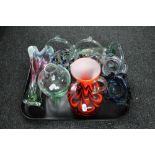 A tray of coloured glass, glass baskets,