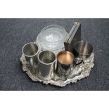 A silver plated tray, pewter tankards,