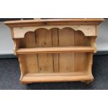 A vintage pine plate rack