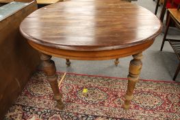 A stained pine nineteenth century table