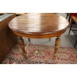 A stained pine nineteenth century table