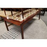 A Scandinavian tiled topped coffee table