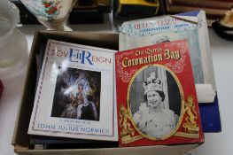 A box of vintage commemorative coronation books,