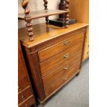 An Edwardian mahogany four drawer chest