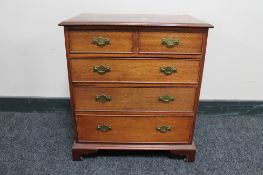 A reproduction mahogany miniature five drawer chest CONDITION REPORT: In good