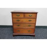 A reproduction mahogany miniature five drawer chest CONDITION REPORT: In good