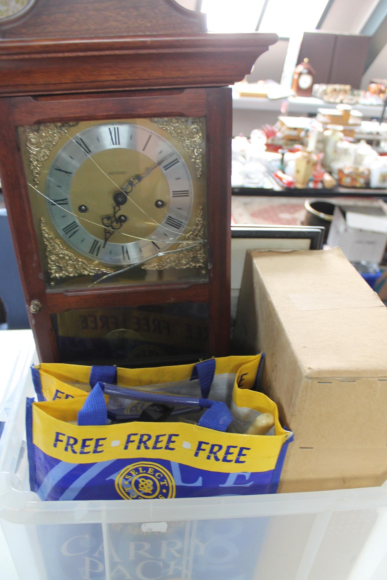 A box of wall clock, cutlery, Christmas tree decorations,