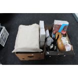 Two boxes containing headphones, wooden duck figure, Kodak carousels,