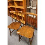 A pair of stick back beech armchairs