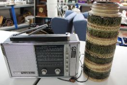 A Wet German pottery vase and a Sanyo trans world radio