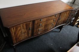 A reproduction mahogany sideboard