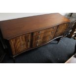 A reproduction mahogany sideboard