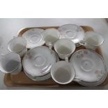 A tray of Royal Doulton Twilight Rose tea china