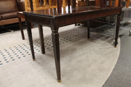 A mahogany coffee table together with two lamps tables