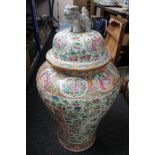 A large Cantonese 19th century lidded urn CONDITION REPORT: Height 85cm.