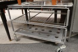 A metal three tier trolley