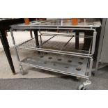 A metal three tier trolley