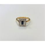 An antique 18ct gold sapphire and diamond ring