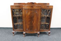 A mid 20th century mahogany breakfronted bookcase