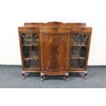 A mid 20th century mahogany breakfronted bookcase